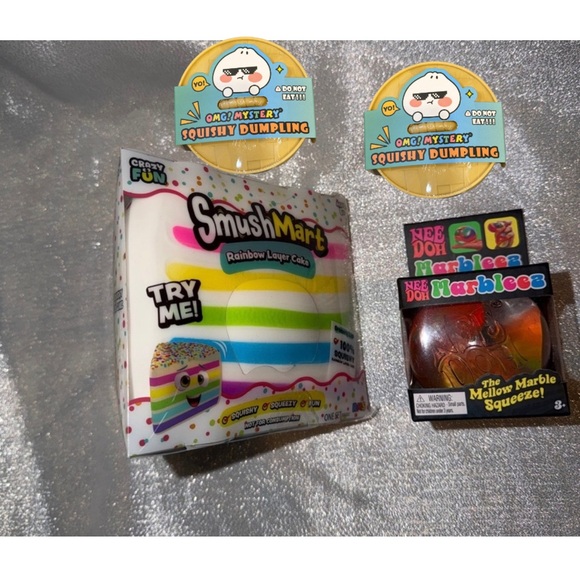 Squishy gift package including 2 omg! dumplings 1 cake and 1 NeeDoh Marbleez